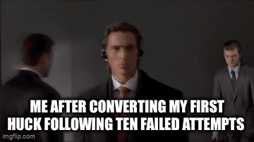 A Man In A Suit And Tie Is Wearing Headphones While Standing In Front Of A Group Of People . GIF