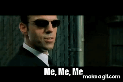 A Man In A Suit And Tie Is Wearing Sunglasses And Saying `` Me , Me , Me `` . GIF