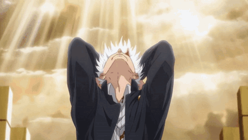A Man In A Suit And Tie Looks Up At The Sky GIF