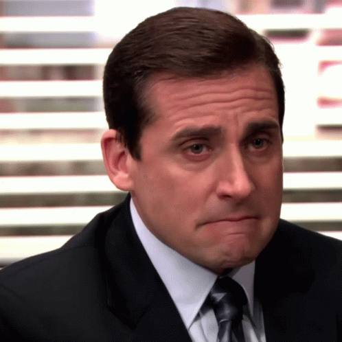 Man In Suit Making Funny Face GIF