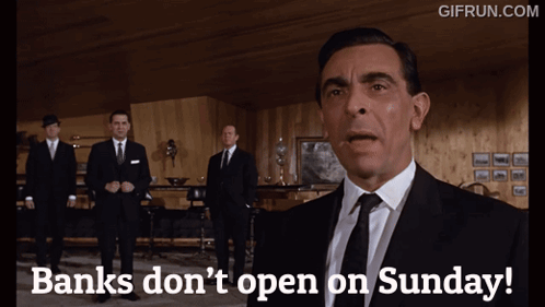 A Man In A Suit And Tie Says " Banks Don 'T Open On Sunday " GIF