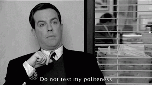 A Man In A Suit And Tie Says " Do Not Test My Politeness " In A Black And White Photo GIF