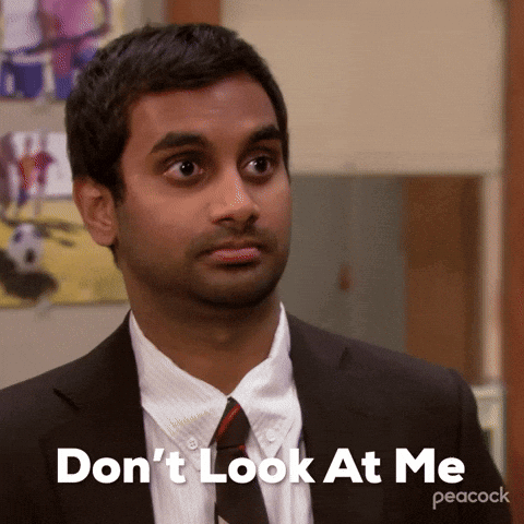 A Man In A Suit And Tie Says Don 'T Look At Me GIF