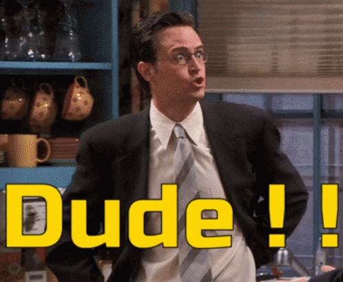 A Man In A Suit And Tie Says Dude In Yellow GIF