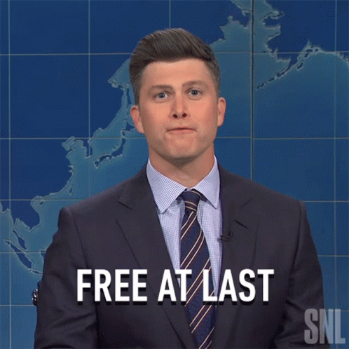 A Man In A Suit And Tie Says " Free At Last " In Front Of A Map GIF