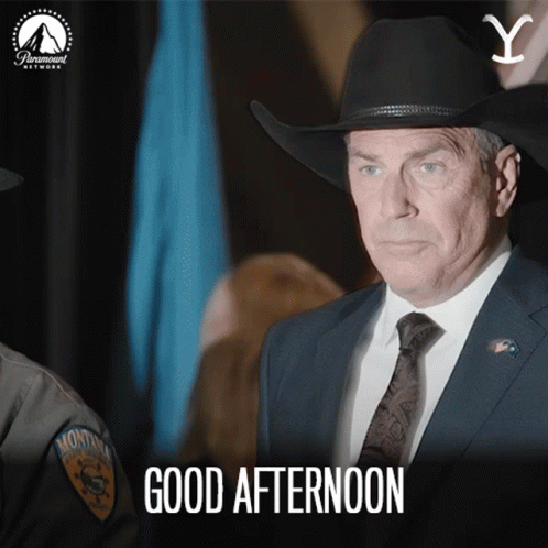 A Man In A Suit And Tie Says Good Afternoon In A Paramount Network Ad GIF