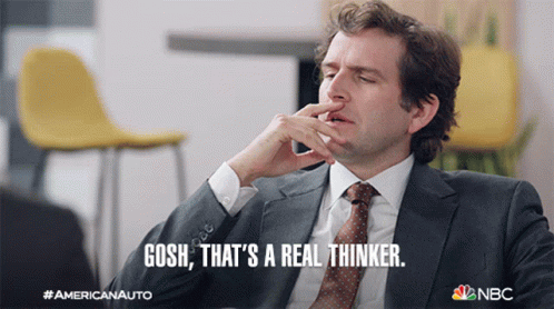 A Man In A Suit And Tie Says " Gosh " That 'S A Real Thinker GIF