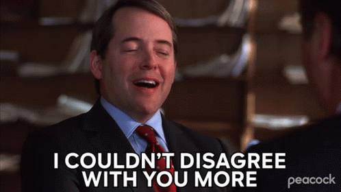 A Man In A Suit And Tie Says I Couldn T Disagree With You More GIF