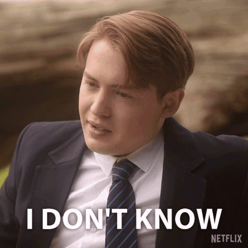 A Man In A Suit And Tie Says I Don T Know GIF