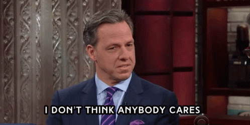A Man In A Suit And Tie Says " I Don T Think Anybody Cares " GIF