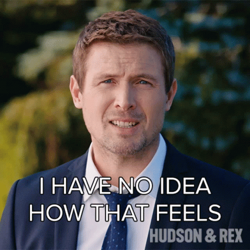 A Man In A Suit And Tie Says " I Have No Idea How That Feels Hudson & Rex " GIF