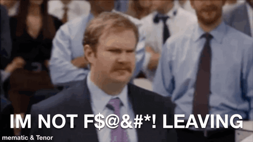 Man In Suit Says Im Not Leaving In Front Of Crowd GIF