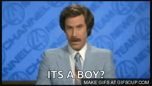 A Man In A Suit And Tie Says It Is A Boy GIF