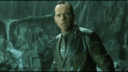 A Man In A Suit And Tie Says It 'S A Trick .. GIF