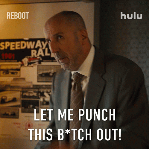 A Man In A Suit And Tie Says " Let Me Punch This Bitch Out " GIF