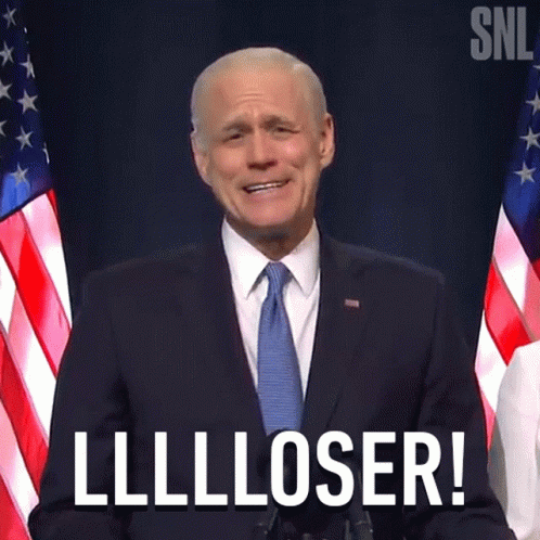 a man in a suit and tie says lllloser