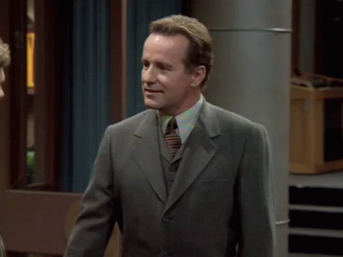 A Man In A Suit And Tie Says " Maybe " And " Or Maybe I Just Like Canes " GIF