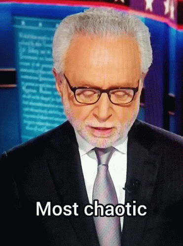 A Man In A Suit And Tie Says Most Chaotic On The Screen GIF