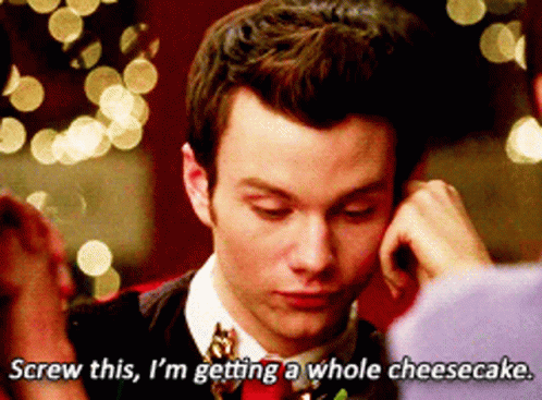 A Man In A Suit And Tie Says " Screw This I 'M Getting A Whole Cheesecake " GIF