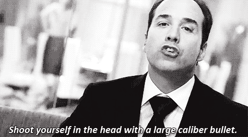 A Man In A Suit And Tie Says Shoot Yourself In The Head With A Large Caliber Bullet . GIF