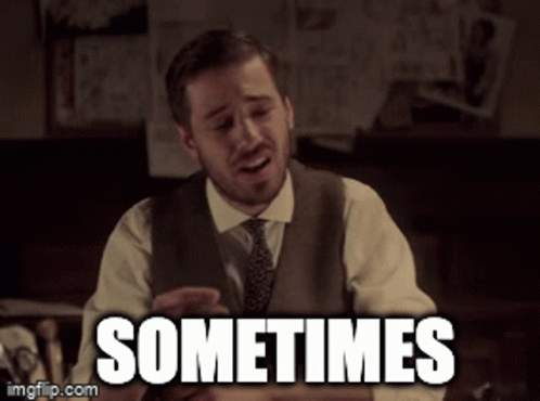 A Man In A Suit And Tie Says Sometimes In Front Of A Desk GIF