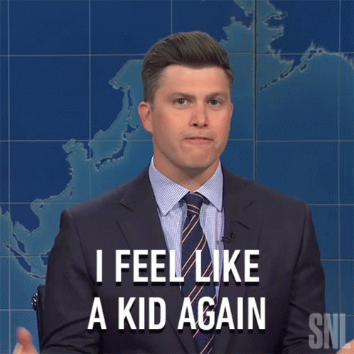 A Man In A Suit And Tie Says That He Feels Like A Kid Again GIF