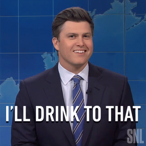 A Man In A Suit And Tie Says That He 'Ll Drink To That GIF