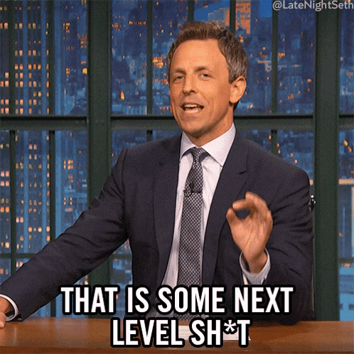 A Man In A Suit And Tie Says That Is Some Next Level Sh*t GIF