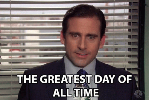 Man In Suit And Tie Says The Greatest Day Of All Time GIF