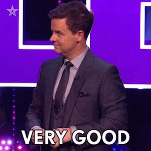Man In Suit And Tie Says Very Good GIF