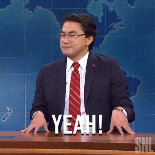 A Man In A Suit And Tie Says Yeah On A Snl Show GIF