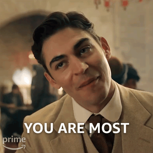 A Man In A Suit And Tie Says " You Are Most " In Front Of Him GIF