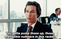 A Man In A Suit And Tie Says You Gotta Pump Those Up Those Are Rookie Numbers In This Racket . GIF
