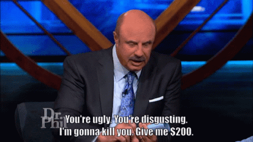A Man In A Suit And Tie Says " You 'Re Ugly " GIF