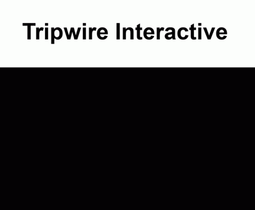 A Man In A Suit And Tie Shakes Hands With Another Man In A Hallway With Tripwire Interactive Written On The Top GIF