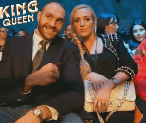 A Man In A Suit And Tie Sits Next To A Woman With The Words King Queen On The Bottom GIF