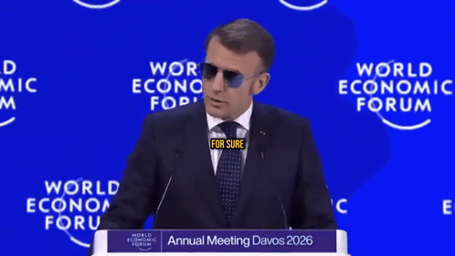 A Man In A Suit And Tie Stands At A Podium At The World Economic Forum GIF
