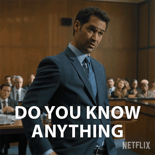 A Man In A Suit And Tie Stands In Front Of A Courtroom And Says " Do You Know Anything " GIF