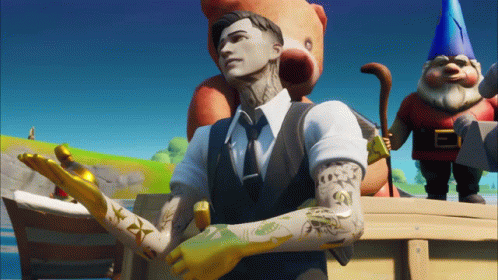 A Man In A Suit And Tie Stands In Front Of A Teddy Bear And A Gnome GIF