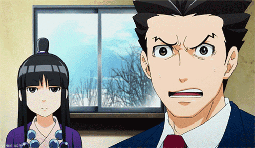 Man In Suit And Woman In Purple Dress GIF