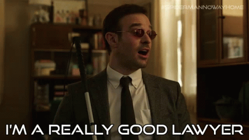 a man in a suit and tie with a cane says i 'm a really good lawyer