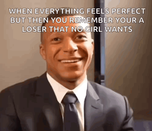 A Man In A Suit And Tie With A Caption That Says When Everything Feels Perfect But Then You Remember Your A Loser GIF