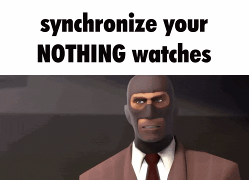 A Man In A Suit And Tie With A Mask On His Face Says Synchronize Your Nothing Watches GIF