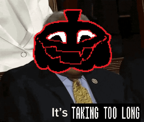 A Man In A Suit And Tie With A Pumpkin Face On His Face And The Words It 'S Taking Too Long GIF