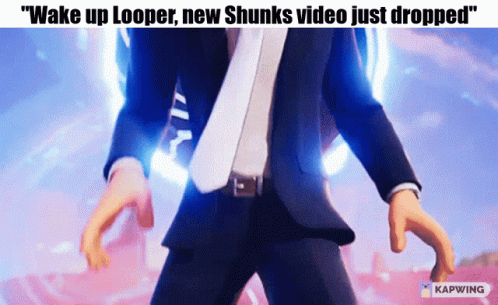 A Man In A Suit And Tie With The Caption " Wake Up Looper New Chunks Video Just Dropped " GIF