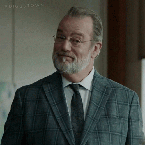 A Man In A Suit And Tie With The Hashtag #Diggstown GIF