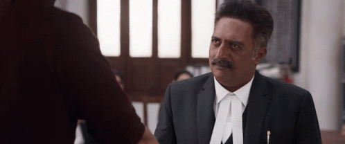 Man In Suit And Tie With A On Shirt GIF