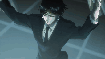 A Man In A Suit And Tie With The Letter H On His Chest GIF
