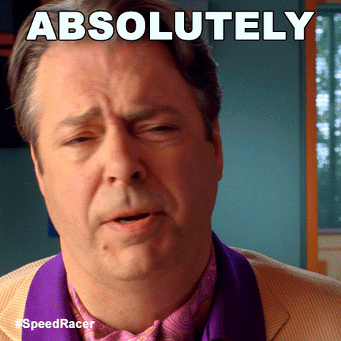 A Man In A Suit And Tie With The Words Absolutely Above Him GIF