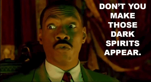 A Man In A Suit And Tie With The Words " Do N't You Make Those Dark Spirits Appear " On The Bottom GIF